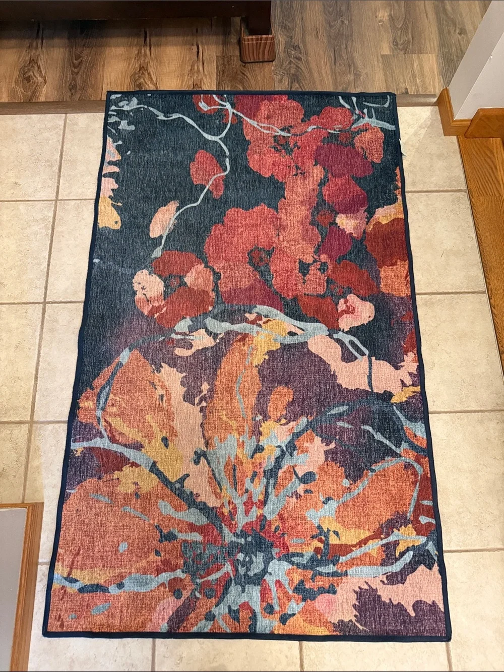 Ruggable flat woven watercolor floral rug in Navy and Coral. Cover only